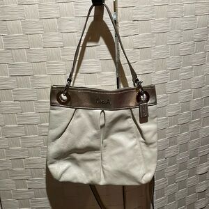 Coach cream and gold handbag brand new never used. Excellent condition.